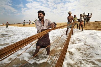 Pescadores en la playa de Kollam.