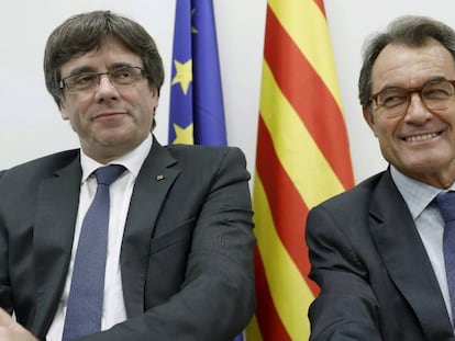 Puigdemont y el expresidente catalán Artur Mas, en un comité nacional del PDeCAT celebrado el 2 de octubre de 2017.