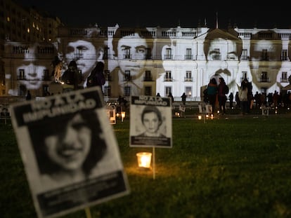 The La Moneda Palace illuminated with faces of victims of the Augusto Pinochet dictatorship.