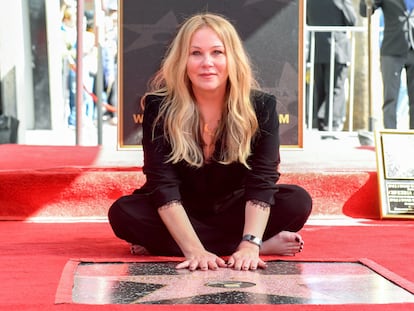 Actress Christina Applegate poses with her star on the Hollywood Walk of Fame on November 14, 2022.