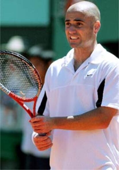 Andre Agassi se lamenta de su derrota ante Jerome Haehnel.