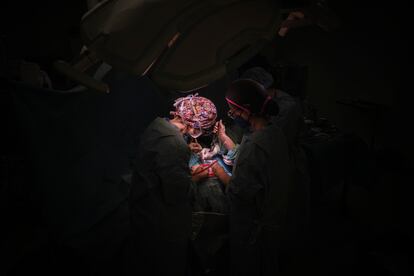 Gloria Villalba operates on a patient with a malignant brain tumor.