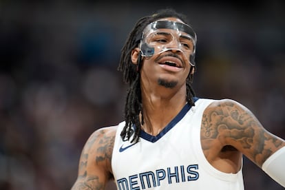 Memphis Grizzlies guard Ja Morant looks to the bench during the second half of the team's NBA basketball game against the Denver Nuggets on Friday, March 3, 2023.