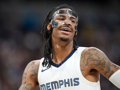 Memphis Grizzlies guard Ja Morant looks to the bench during the second half of the team's NBA basketball game against the Denver Nuggets on Friday, March 3, 2023.