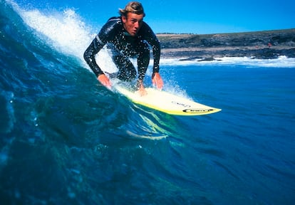 Young adult man surfing, Lanzarote, Canary Islands