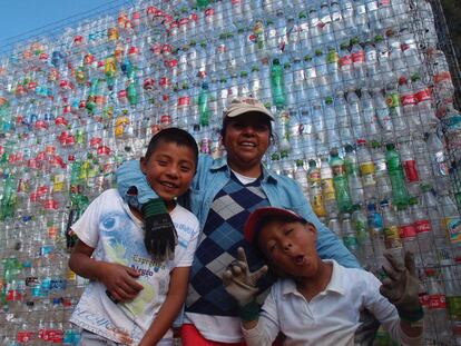 Lupita and her two sons. If all goes well, they should have a two-bedroom, one-bathroom home by Easter.