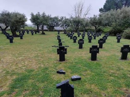 Desecrated tombstones in the cemetery.