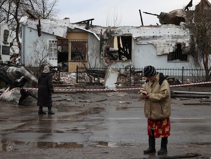 A woman looks at the damage to a museum destroyed by a Russian drone attack in Lviv on Monday.