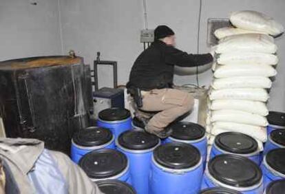 A policeman at work during the cocaine raid in Madrid.