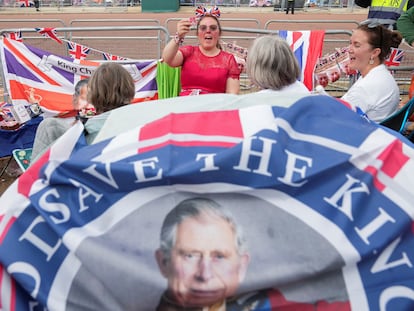 A group of women camp out on The Mall near Buckingham Palace on May 5, 2023.