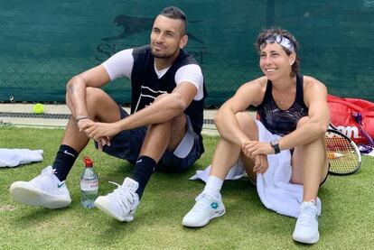 Kyrgios y Carla Suárez, durante el entrenamiento de este miércoles.