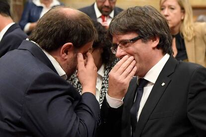 Catalan Premier Carles Puigdemont and his deputy Oriol Junqueras on Tuesday.