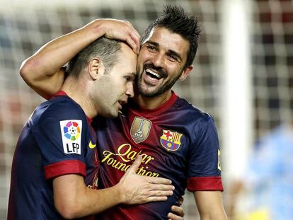 Villa e Iniesta celebran un gol del Barça en 2012