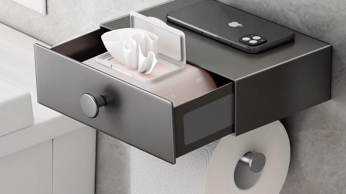 Portarrollos reversible para el papel higiénico con cajón deslizante.