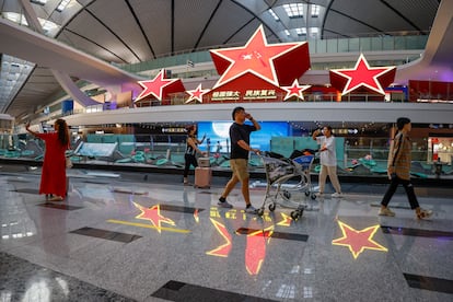 Travelers at Beijing-Daxing International Airport on August 31