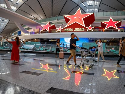 Travelers at Beijing-Daxing International Airport on August 31.