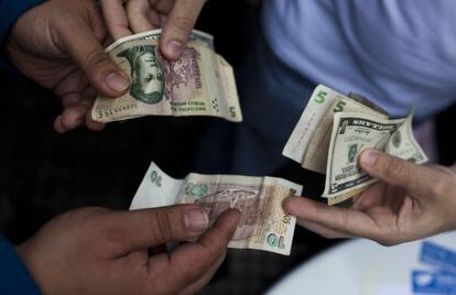 Dollars being exchanged for pesos in Buenos Aires.