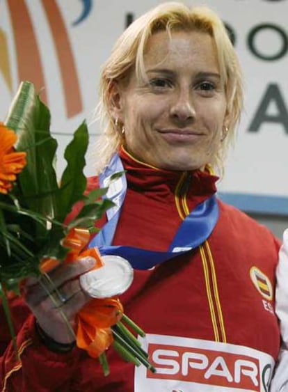 Marta Domínguez, en el podio.