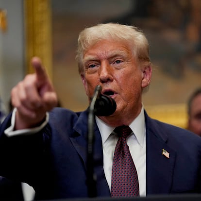 U.S. President Donald Trump points a finger as he delivers remarks in the Roosevelt Room at the White House in Washington, D.C., U.S., July 31, 2025. REUTERS/Kent Nishimura