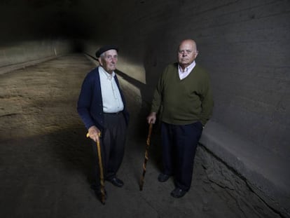 Manuel Pelayo (left), 93, and Manuel Trueba (right), 83, two residents of Vega de Pas in the Cantabria region who participated in the construction of the Engaña tunnel.