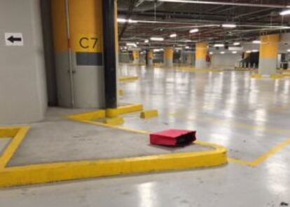 The red bag containing the money and credit cards that was found Sunday in the parking garage of a Mexico City shopping center.
