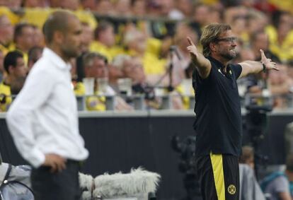 Guardiola y Klopp, durante la final de la Supercopa de Alemania