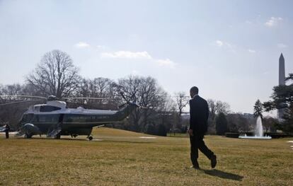Barack Obama à caminho do Marine One.
