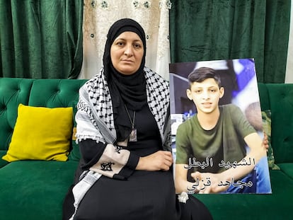 Um Muyahed, inside her home at the Nur Shams refugee camp near the city of Tulkarem, in the West Bank, on Tuesday.