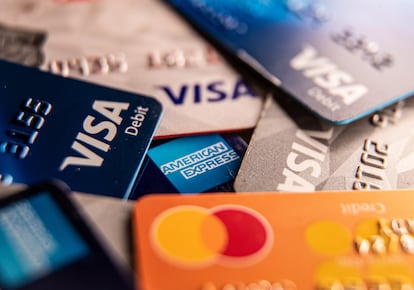 The Visa, Mastercard and American Express logos are seen on credit and debit cards.