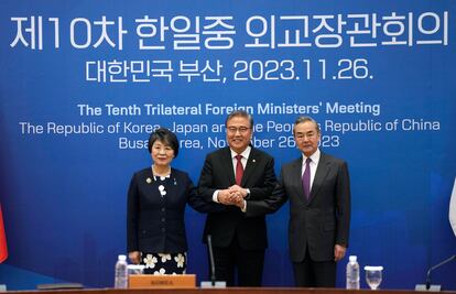 Chinese Foreign Minister Wang Yi, right, South Korean Foreign Minister Park Jin, center, and Japanese Foreign Minister Yoko Kamikawa