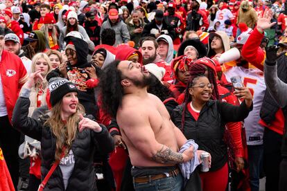 Fans dance to the music during the Kansas City Chiefs' victory celebration and parade in Kansas City, Mo., Wednesday, Feb. 15, 2023.