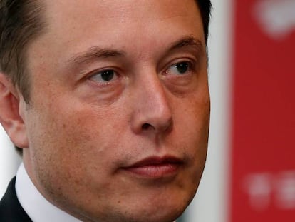 FILE PHOTO: Tesla Motors Inc Chief Executive Elon Musk pauses during a news conference in Tokyo