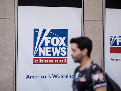 A person walks past the Fox News Headquarters in New York, April. 12, 2023.