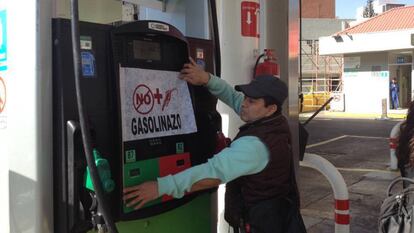 A man in Mexico City protests against a recent hike in gas prices.