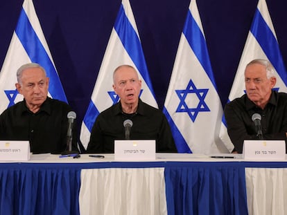 Israeli Prime Minister Benjamin Netanyahu, with Defense Minister Yoav Gallant and Cabinet minister Benny Gantz, holds a press conference in the Kirya military base in Tel Aviv, Israel, October 28, 2023.