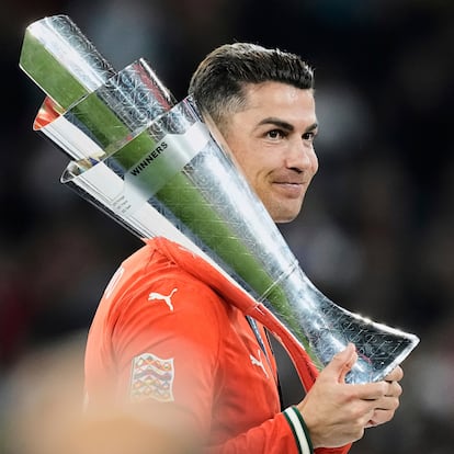 Portugal's Cristiano Ronaldo holds the trophy after winning the Nations League soccer championship at the Allianz Arena in Munich, Germany, Sunday, June 8, 2025. (AP Photo/Martin Meissner)