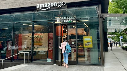 A customer entering an Amazon Go store in Seattle.