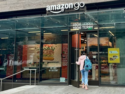 A customer entering an Amazon Go store in Seattle.