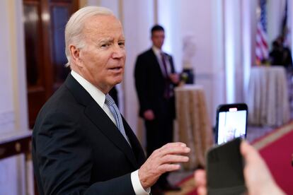 President Joe Biden talks with reporters after speaking in the East Room of the White House in Washington, Jan 20, 2023.