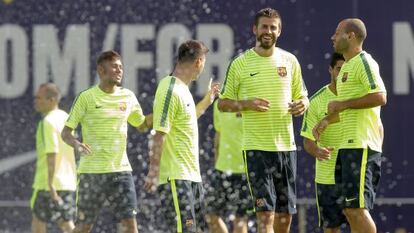 Los jugadores del Barça durante un entrenamiento.