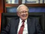 FILE- In this May 7, 2018, file photo, Berkshire Hathaway Chairman and CEO Warren Buffett smiles during an interview in Omaha, Neb., with Liz Claman on Fox Business Network's "Countdown to the Closing Bell." Berkshire Hathaway Inc. reports earnings Saturday, Nov. 3. (AP Photo/Nati Harnik, File)