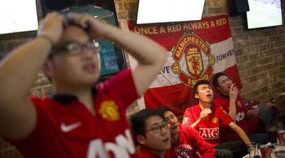 Aficionados del Manchester United en Shanghai.