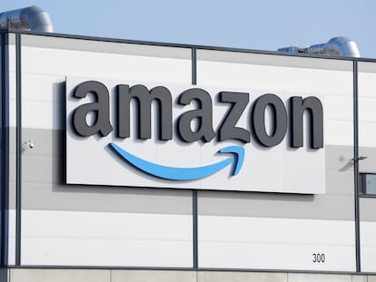 An Amazon company logo marks the facade of a building, March 18, 2022, in Schoenefeld near Berlin.