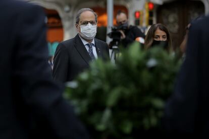 Catalan premier Quim Torra (c) and regional government spokesperson Meritxell Budó on Catalonia Day.