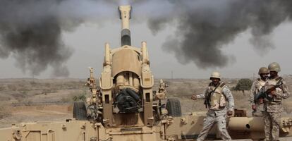 Saudi soldiers fire artillery at the Saudi border with Yemen in this file photo from April 2015.