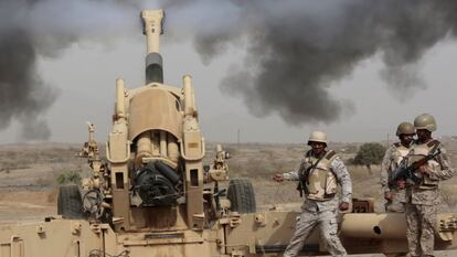 Saudi soldiers fire artillery at the Saudi border with Yemen in this file photo from April 2015.