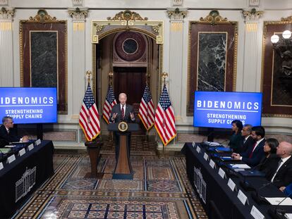 US President Joe Biden (C) delivers remarks during an event to discuss efforts to reduce costs for customers by strengthening supply chains in the economy, in the White House complex in Washington, DC, November 27 2023.