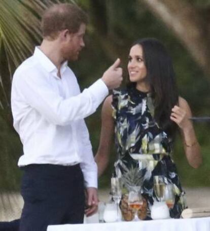 Enrique de Inglaterra y Meghan Markle, en una boda en Jamaica el pasado marzo.