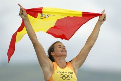 Spain&#039;s Marina Alabau celebrates after crossing the finish line to win the women&#039;s RS-X sailing class during the medal race in Weymouth.