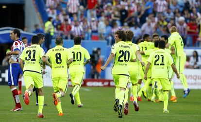 Los jugadores del Barça celebran el titulo de liga